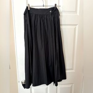 NWOT Reformation maxi skirt in black never been worn with waist ties